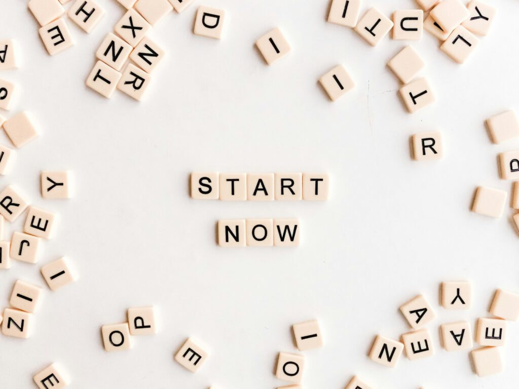 A graphic with scrabble tiles spelling out "Start Now"