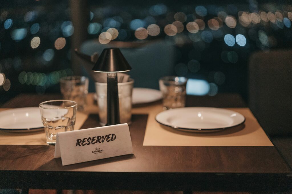 A table set for two with a reserved sign